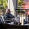 Couple sitting and drinking together on the patio